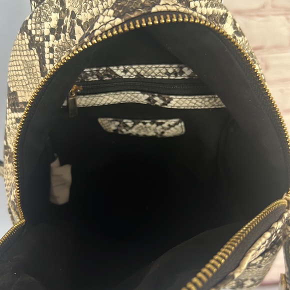 Steve Madden serpentine print small backpack - Picture 6 of 9